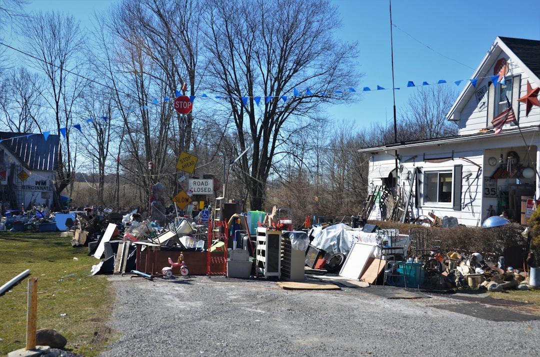House with yard full of uh, collectibles?